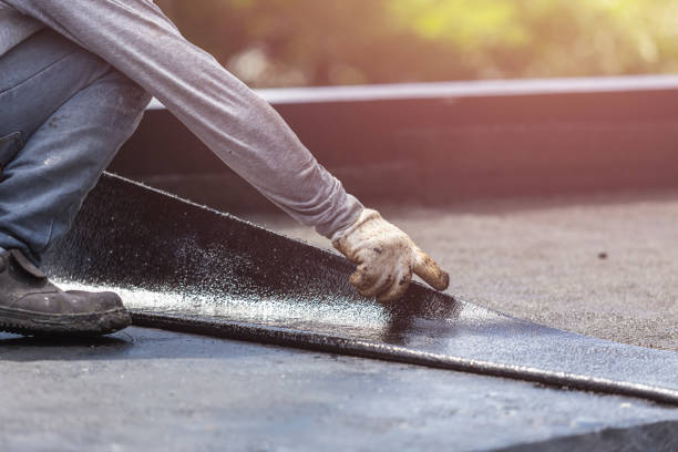 Professional Emergency Waterproofing technician working in Oakley, MI